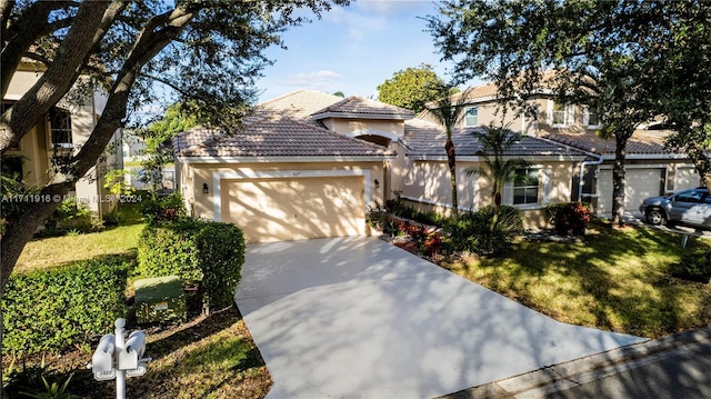 view of front facade featuring a garage and a front lawn