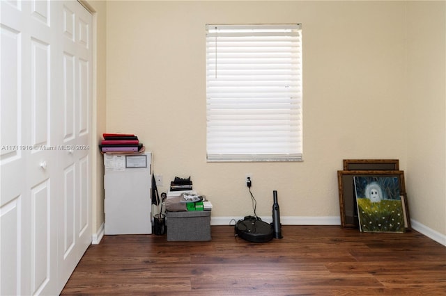 misc room with dark wood-type flooring