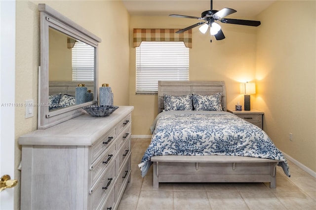 bedroom featuring ceiling fan and light tile patterned flooring