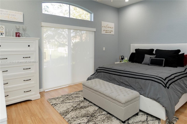 bedroom with light hardwood / wood-style floors