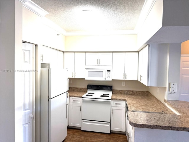 kitchen featuring a textured ceiling, white appliances, dark wood-type flooring, white cabinetry, and crown molding