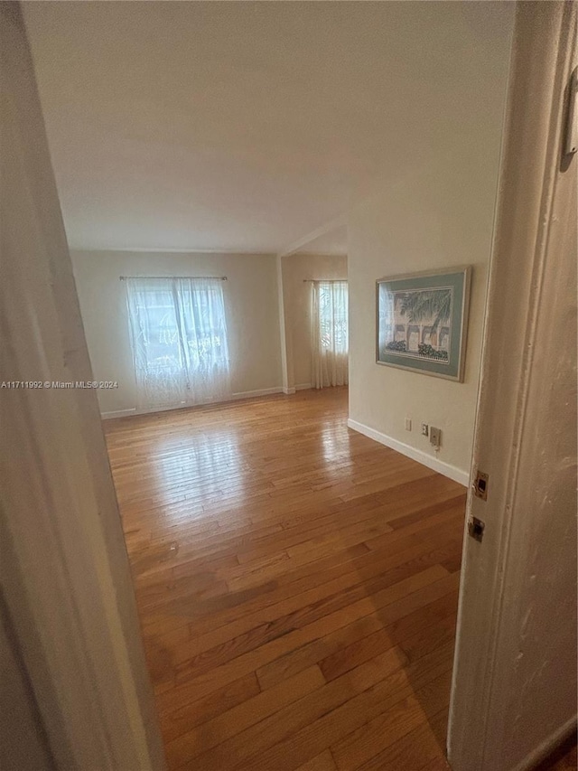 empty room featuring hardwood / wood-style floors