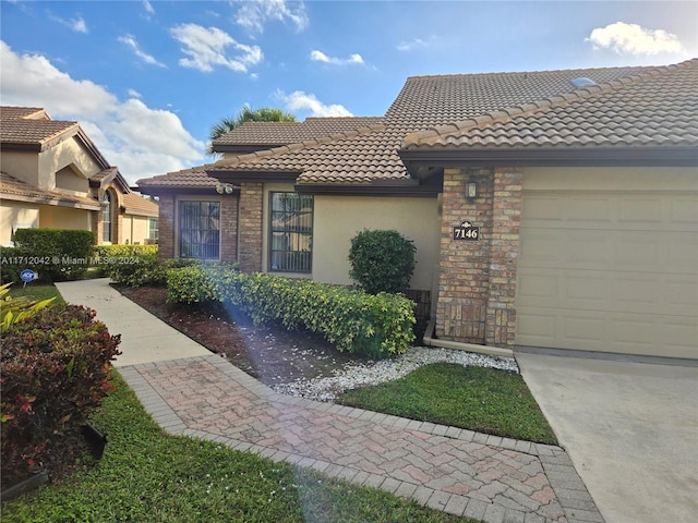 view of front of house with a garage