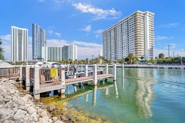 dock area featuring a water view