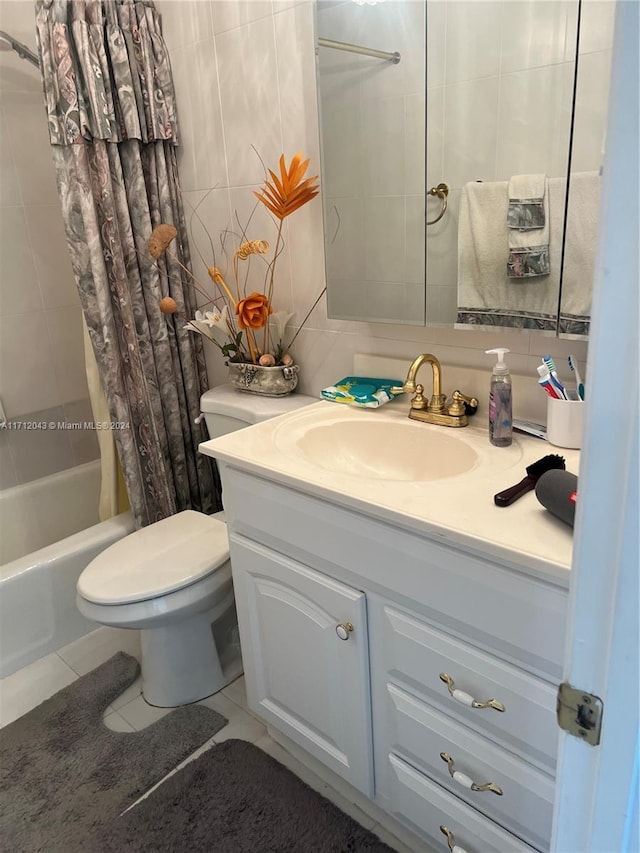 full bathroom with tile patterned flooring, vanity, toilet, and shower / bath combo with shower curtain