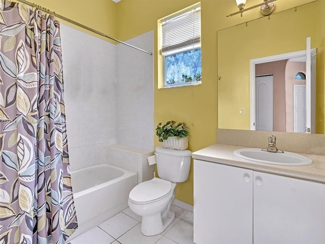 full bathroom with tile patterned floors, vanity, shower / tub combo, and toilet