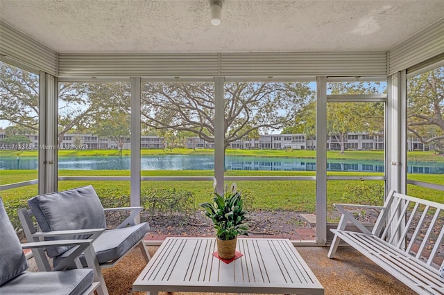 sunroom with a water view