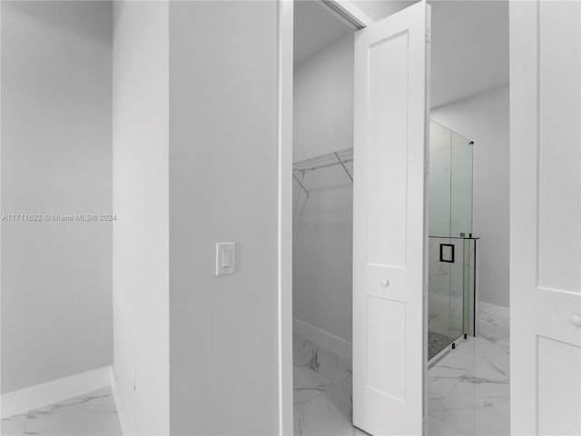 bathroom featuring walk in shower