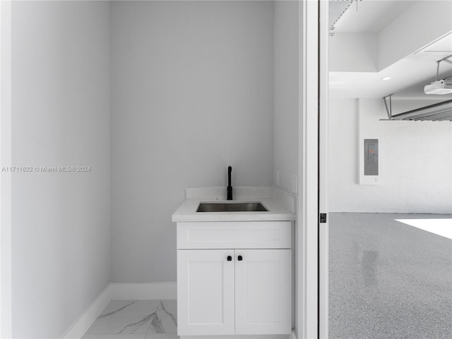 bathroom with vanity and electric panel