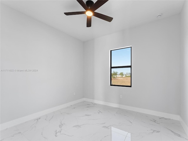 unfurnished room featuring ceiling fan