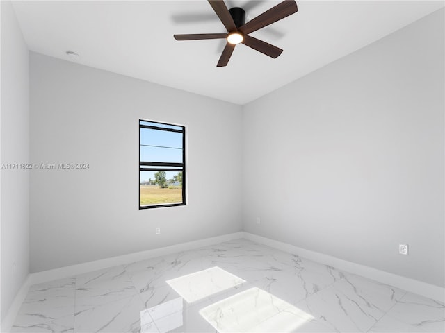 empty room featuring ceiling fan