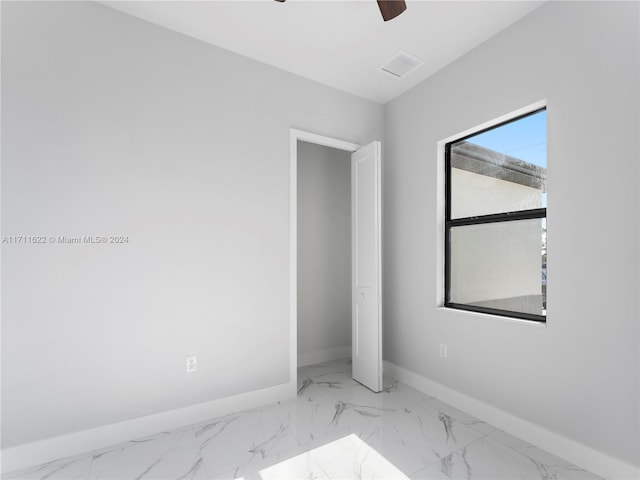 empty room with ceiling fan