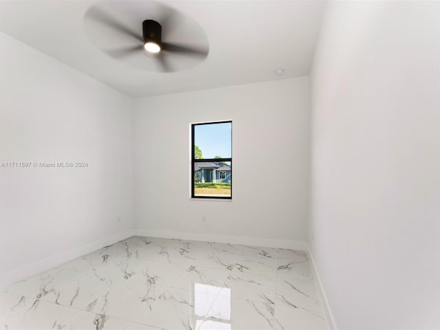 unfurnished room featuring ceiling fan