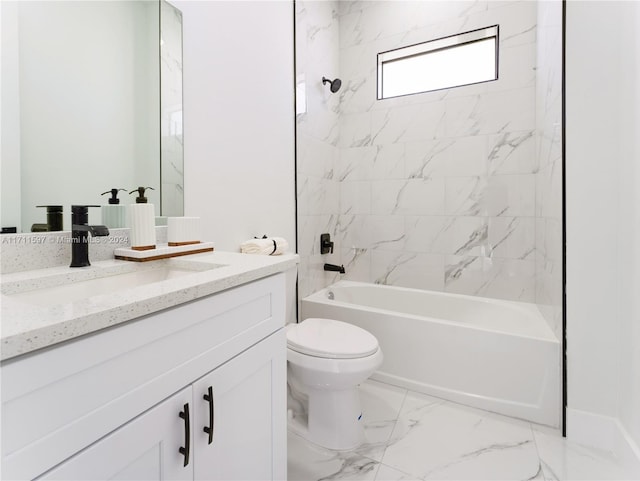 full bathroom featuring vanity, tiled shower / bath combo, and toilet