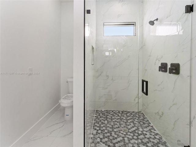 bathroom with toilet and an enclosed shower