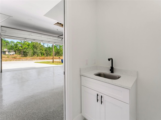 bathroom with vanity and a healthy amount of sunlight