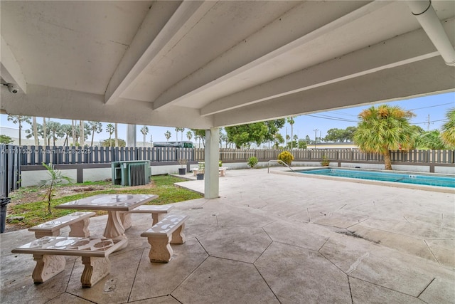 view of patio / terrace featuring a fenced in pool