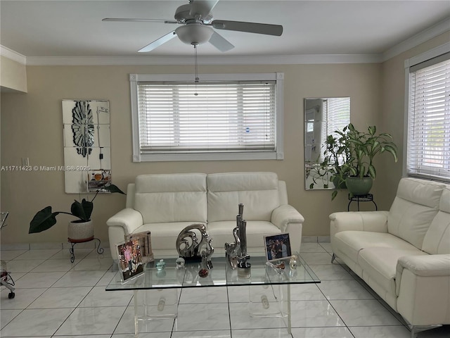 living room with ceiling fan, light tile patterned floors, and crown molding