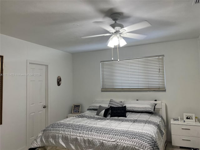 bedroom featuring ceiling fan