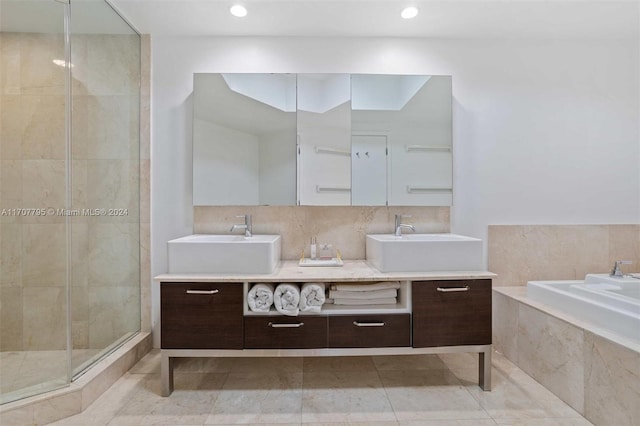 bathroom featuring vanity, tile patterned floors, and a shower with door