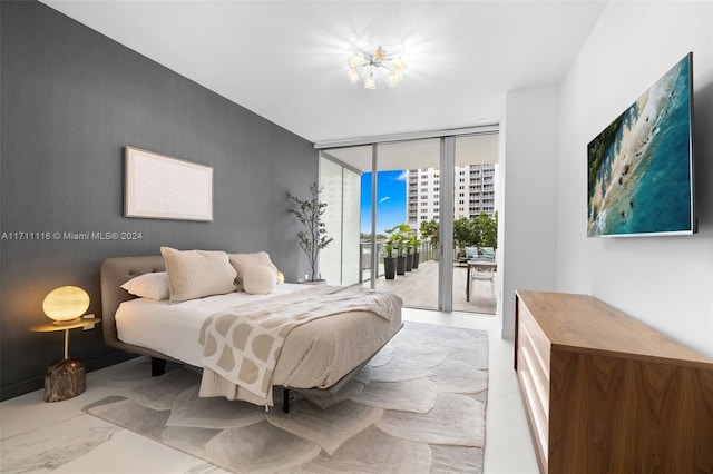 bedroom with access to outside and floor to ceiling windows