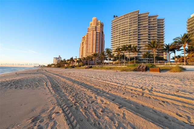 view of community featuring a water view and a view of the beach