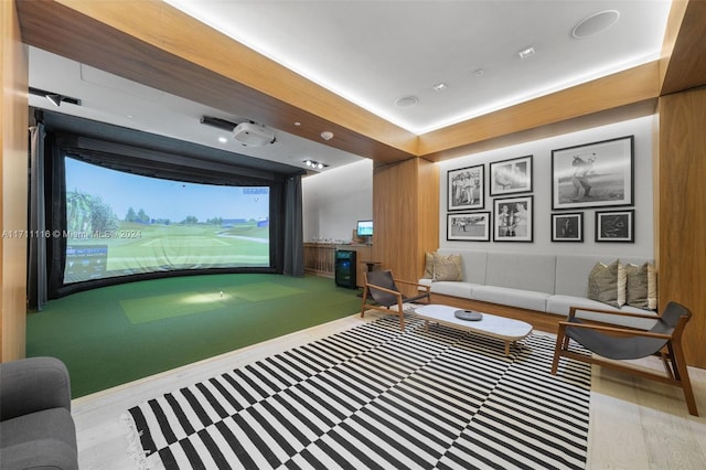 rec room featuring light hardwood / wood-style flooring and golf simulator