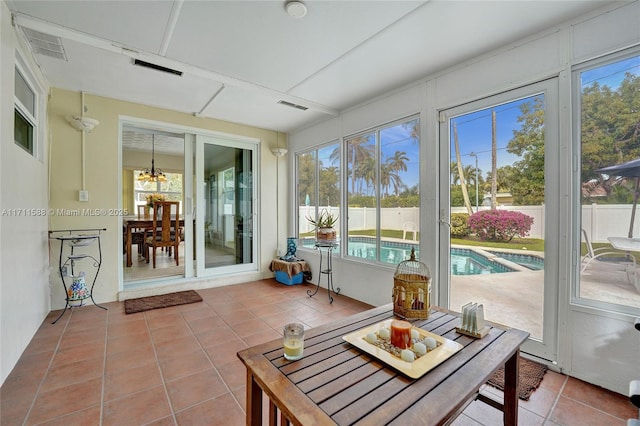 1407 Harding St, Hollywood, FL 33020 - sunroom / solarium featuring a chandelier and visible vents