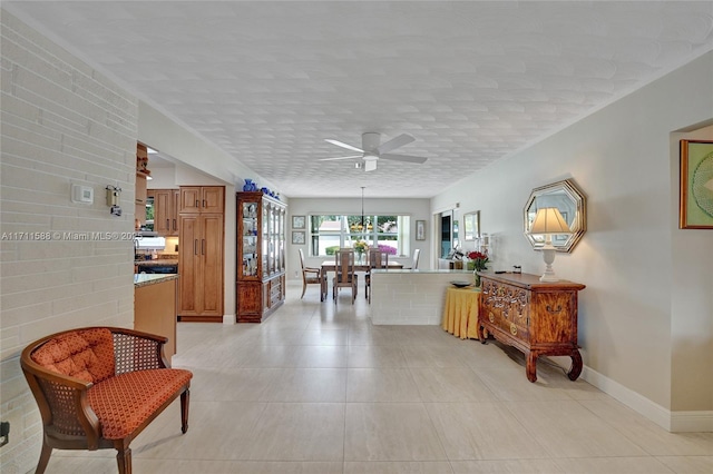1407 Harding St, Hollywood, FL 33020 - corridor featuring baseboards, a chandelier, a textured ceiling, and light tile patterned floors
