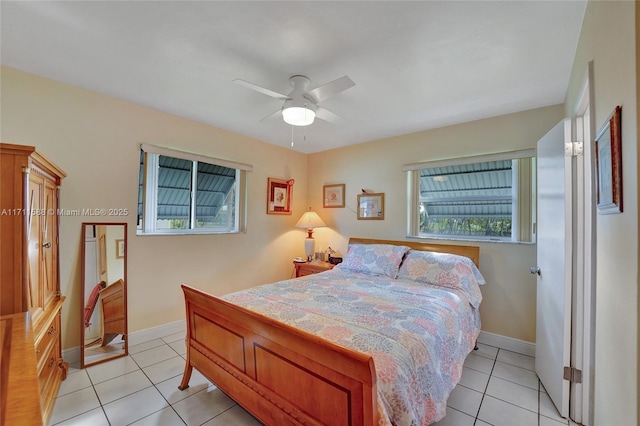 bedroom featuring ceiling fan and light tile patterned flooring