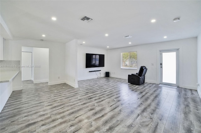 unfurnished room featuring light hardwood / wood-style floors