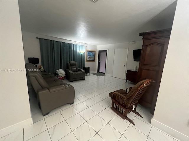 living room with light tile patterned floors