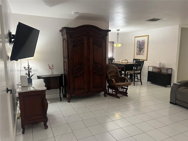 living room with light tile patterned floors