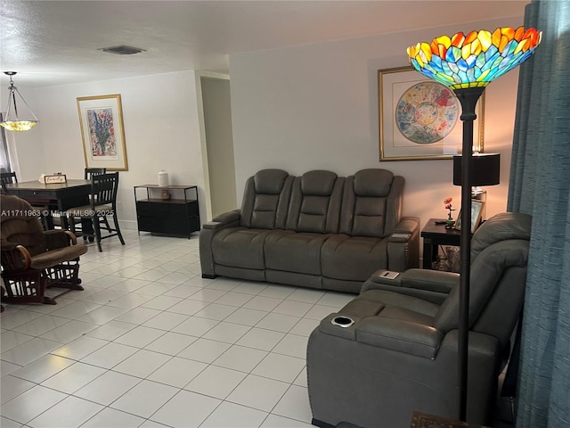 living room featuring light tile patterned flooring