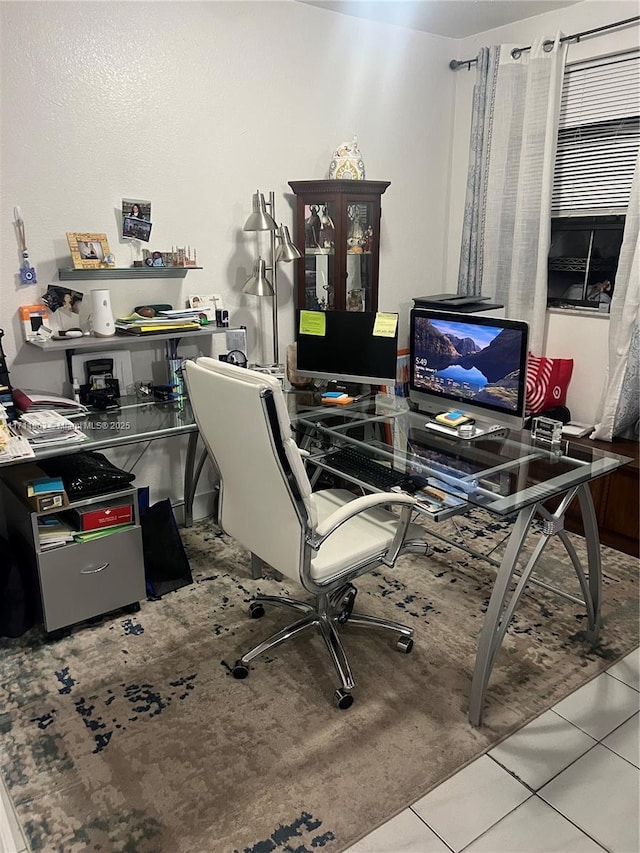 office area with light tile patterned floors