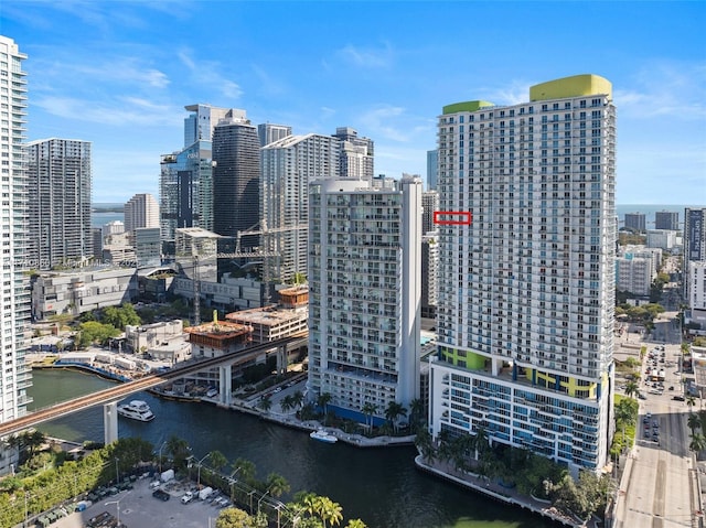 property's view of city featuring a water view