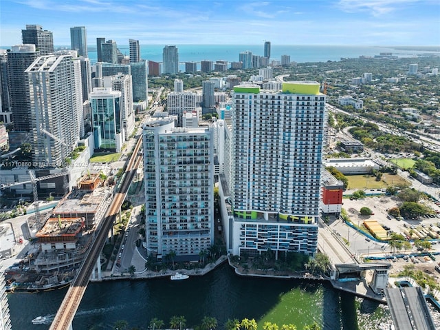 bird's eye view with a water view and a city view