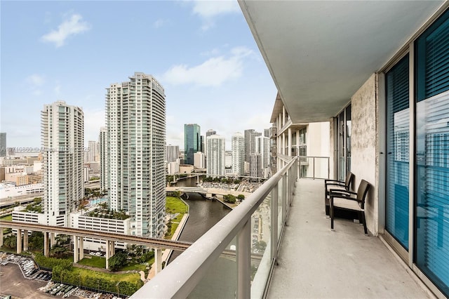 balcony featuring a water view