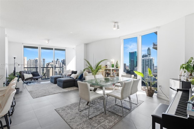 tiled dining area with expansive windows and a city view