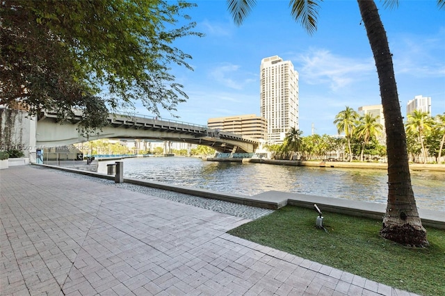 view of home's community with a view of city and a water view