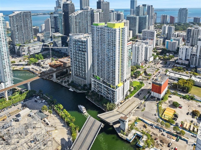 aerial view with a water view and a view of city