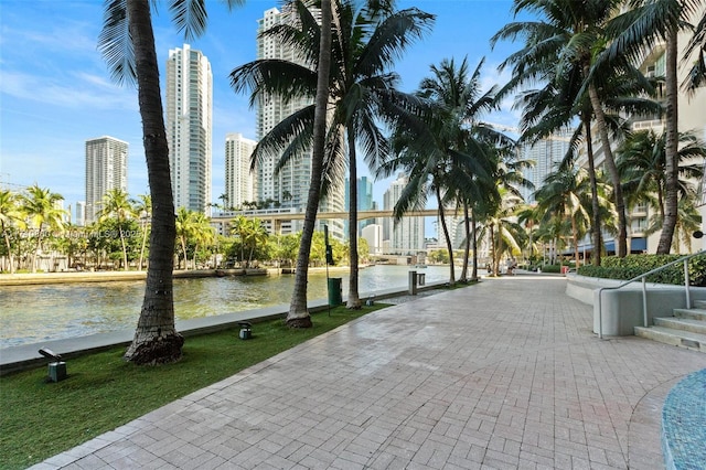 view of property's community featuring a view of city and a water view