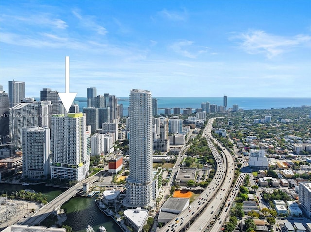 aerial view with a water view and a city view