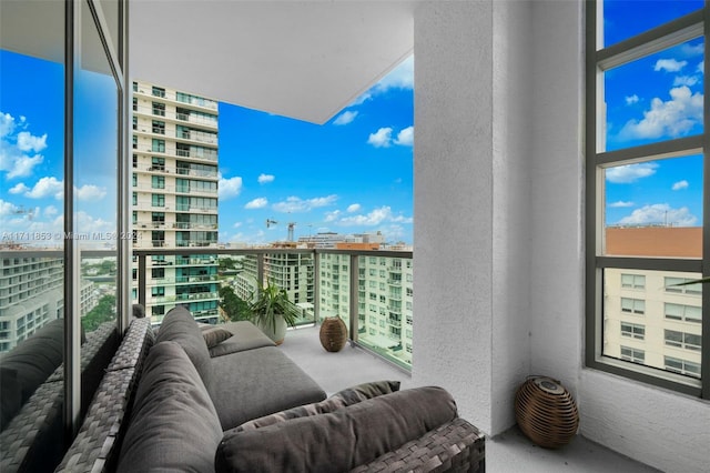 balcony featuring an outdoor living space