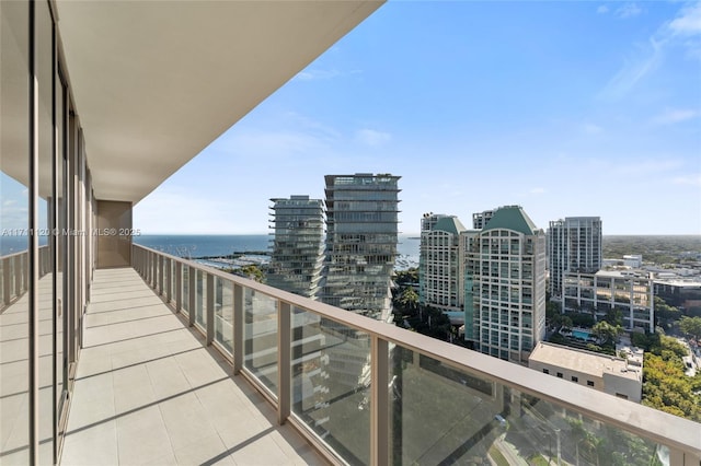 balcony with a city view and a water view