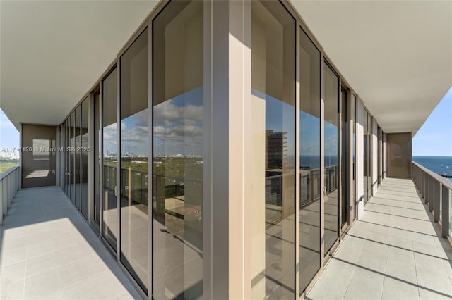 balcony featuring a water view