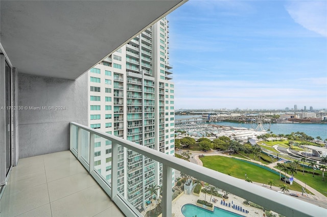 balcony featuring a water view