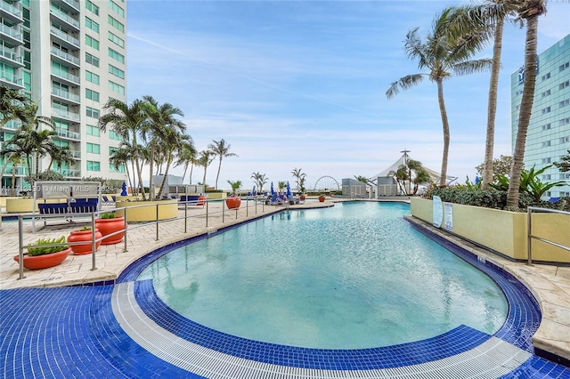 view of swimming pool with a patio area