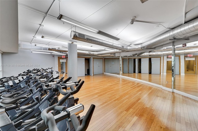 gym featuring wood-type flooring