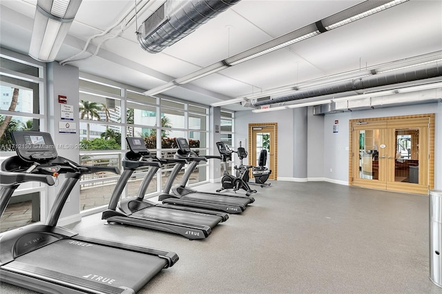 gym featuring french doors